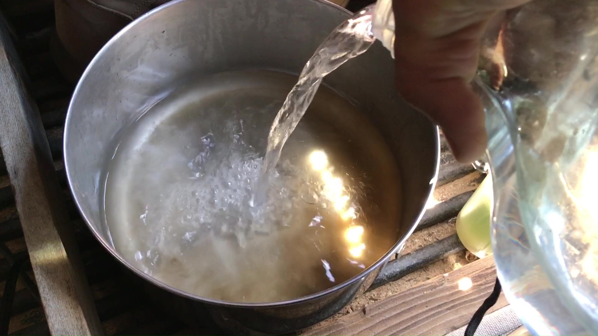 01 Pouring Filtered Water Into Metal Pot