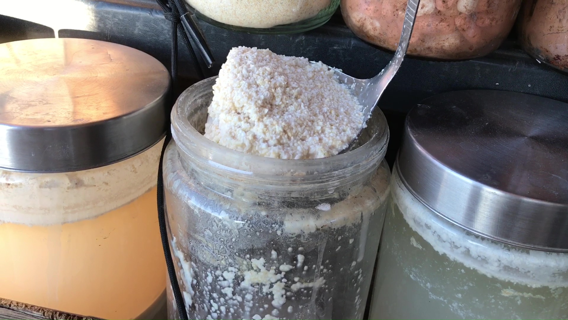 01 Scooping Fermented Rice From Jar