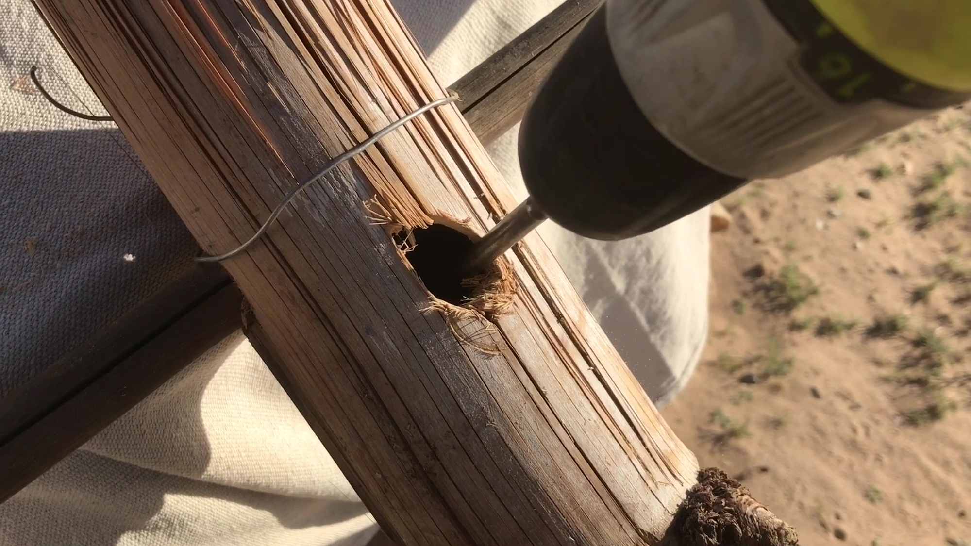 02 Drilling One Inch Hole In Bamboo Pole