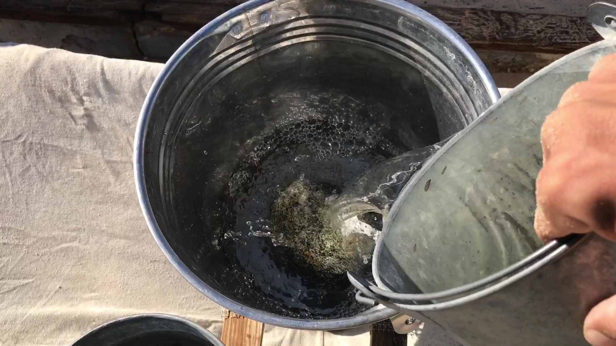 03 Pouring Water Into Bucket Filter