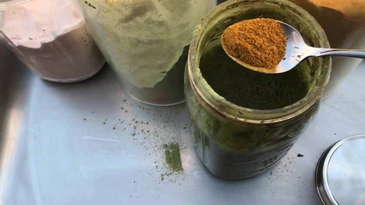 06 Adding Cayenne Pepper And Turmeric Powder To Fermentation Jar