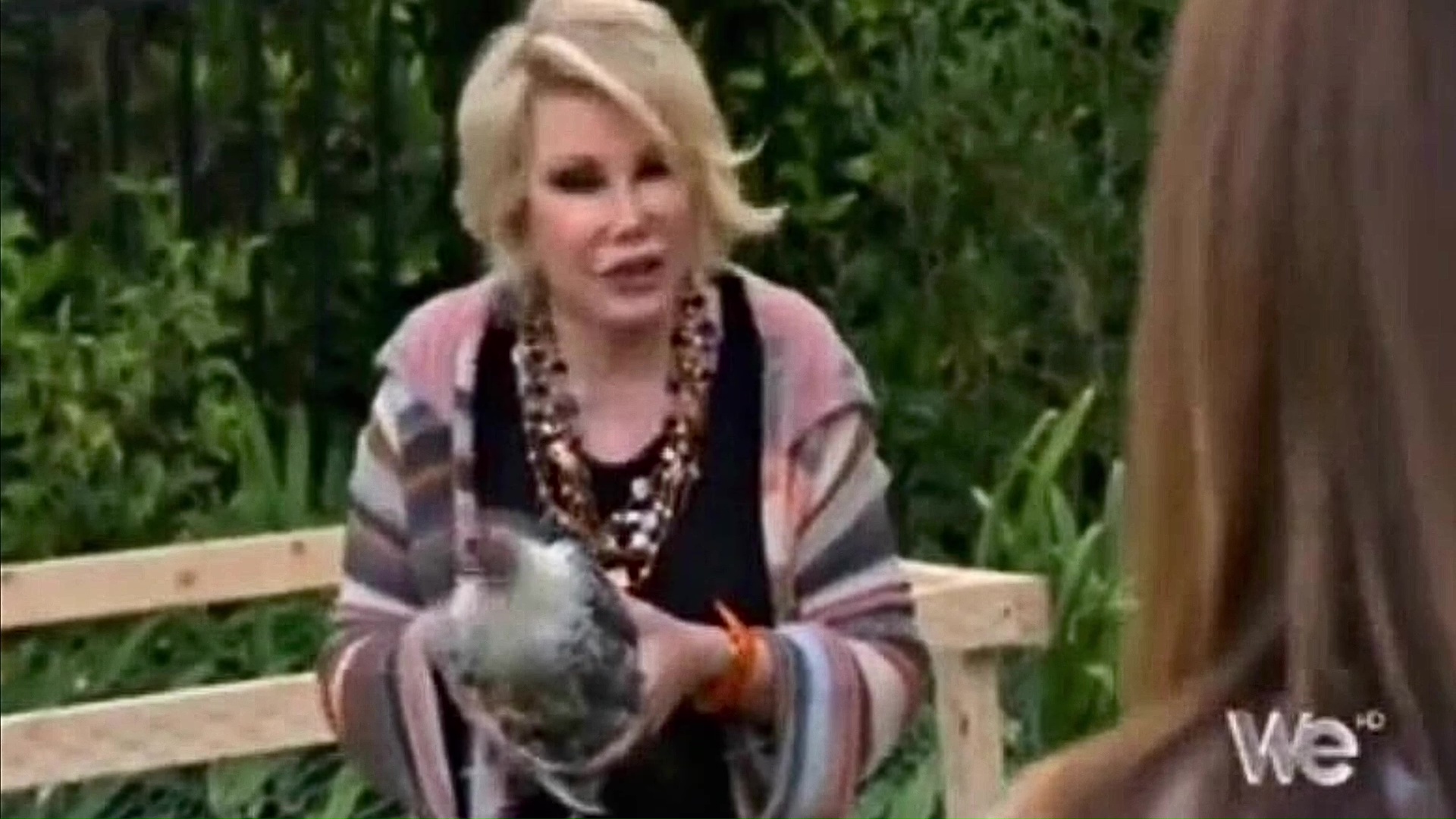 09 Joan Rivers Picking Up And Moving Chicken In Backyard 03