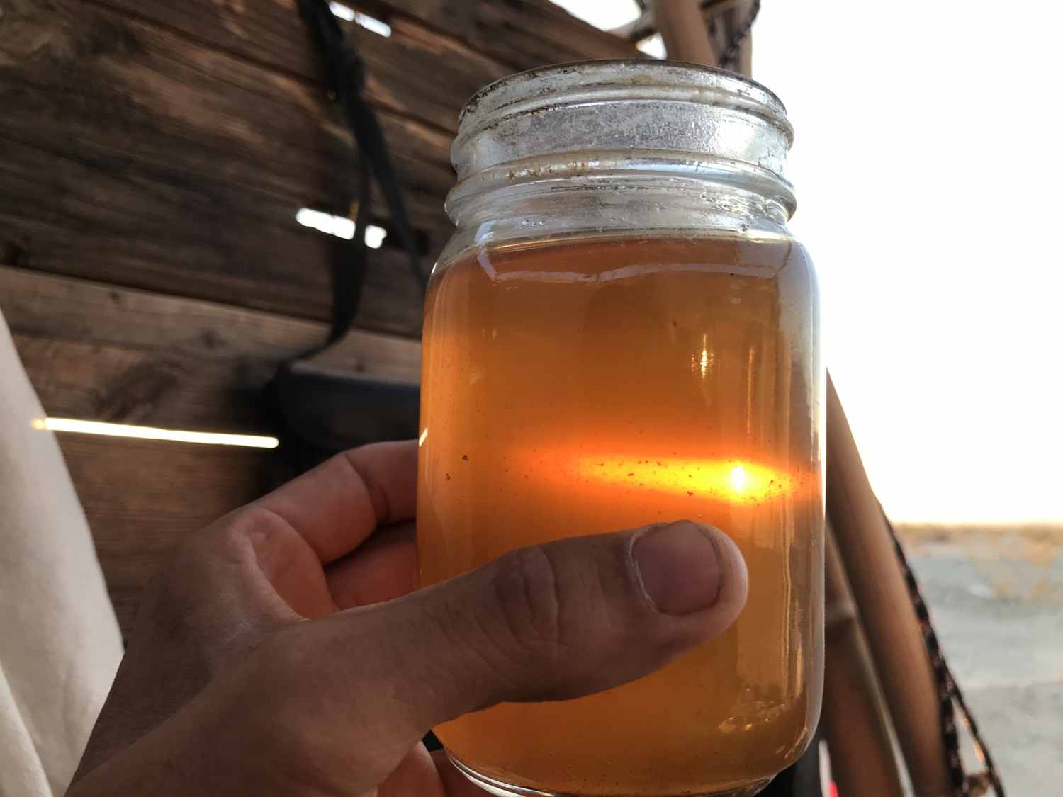 Desert Summer Sunset Through Jar of Raisin Wine