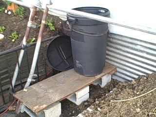 Emergency Irrigation Water Storage Trash Can in the Survival Garden