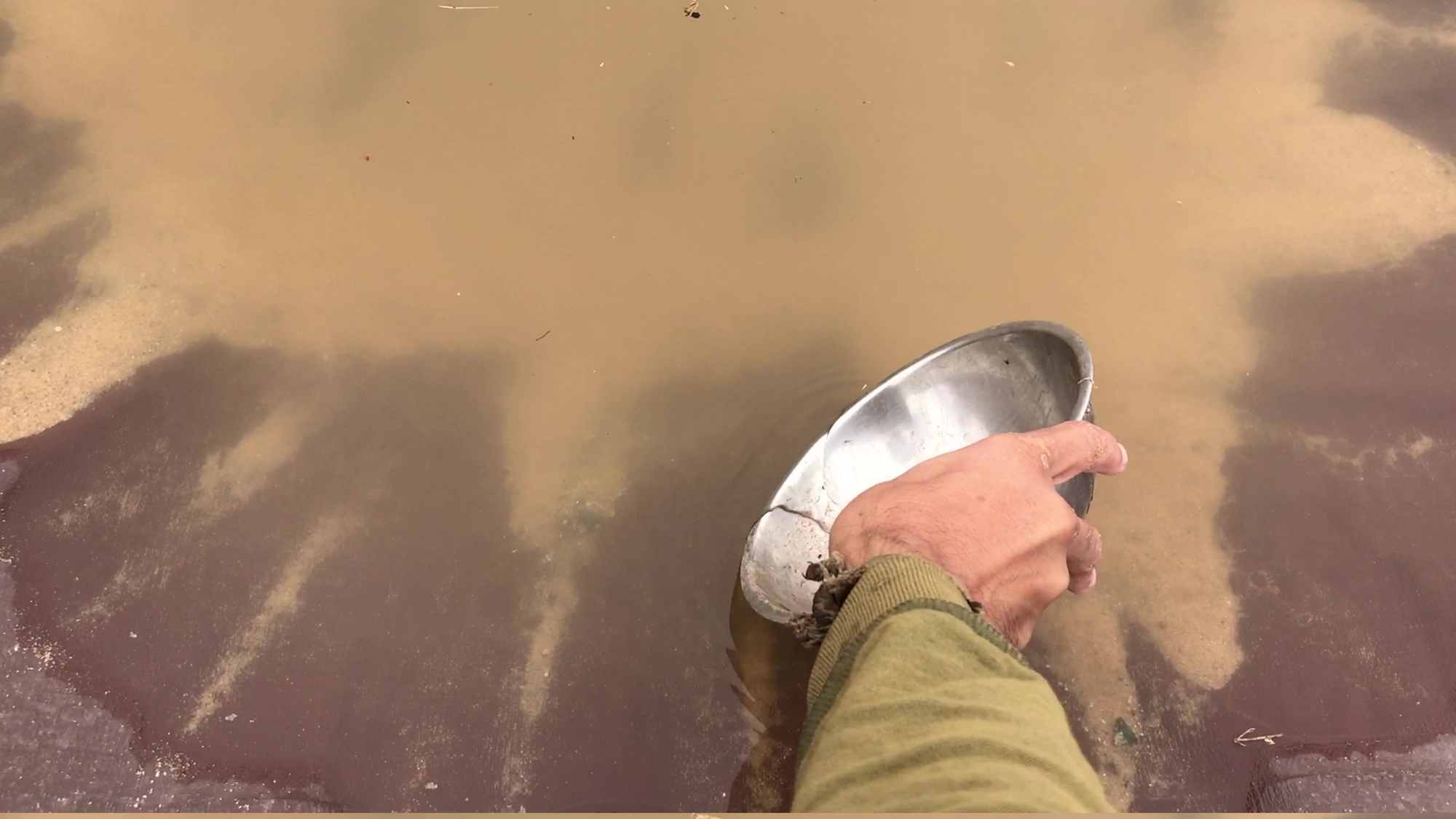 Harvesting Rain Water With Metal Bowl