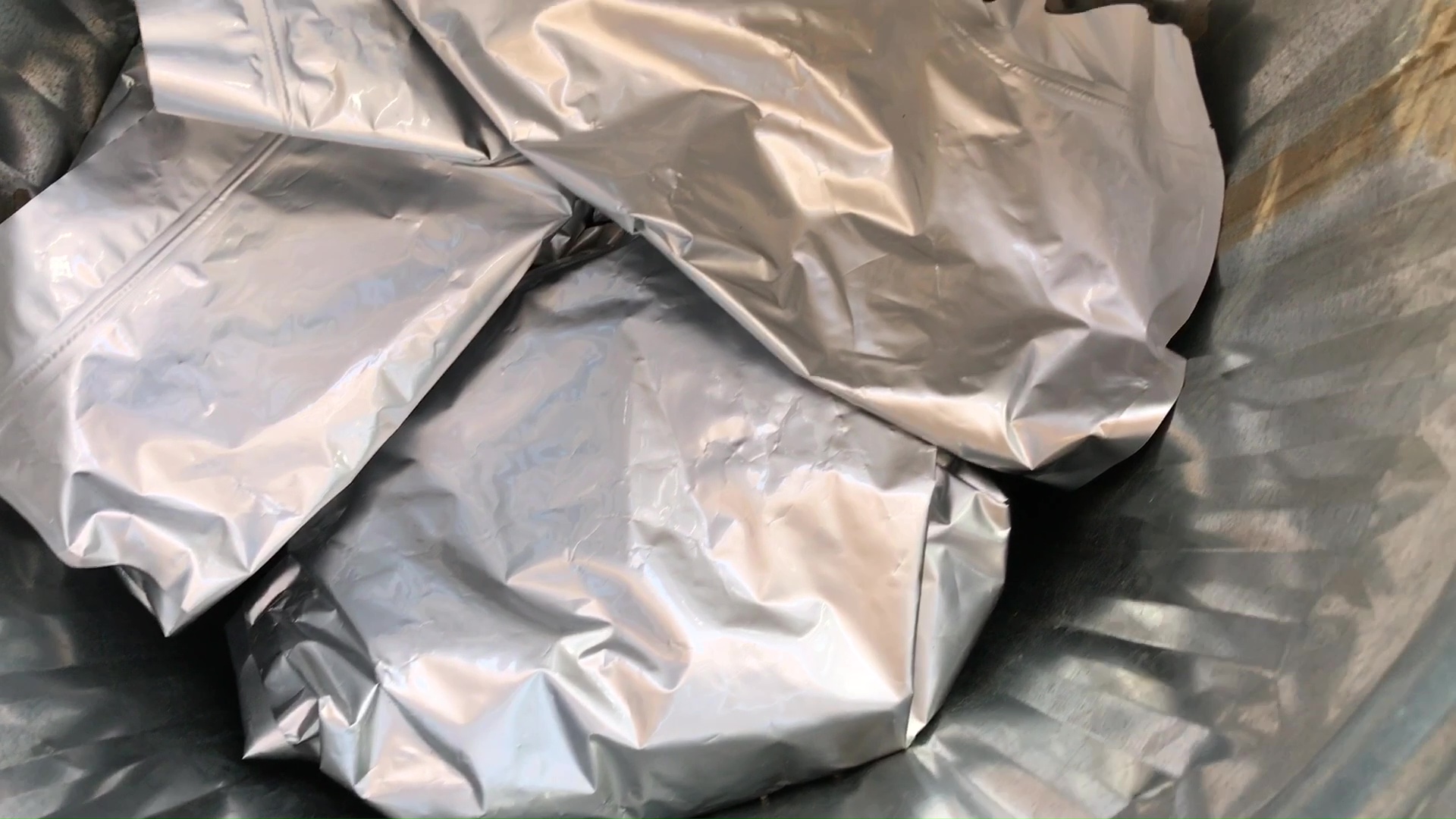 Long Term Rice Food Storage Mylar Bags In Triangle Formation to Stack 2 Levels In A Galvy Trash Can.jpg