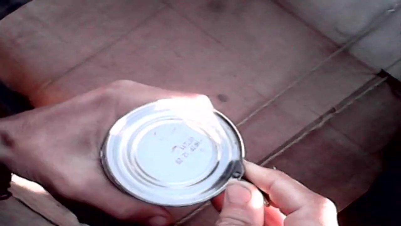 Opening A Can Of Fruit With A P 38 Can Opener 01