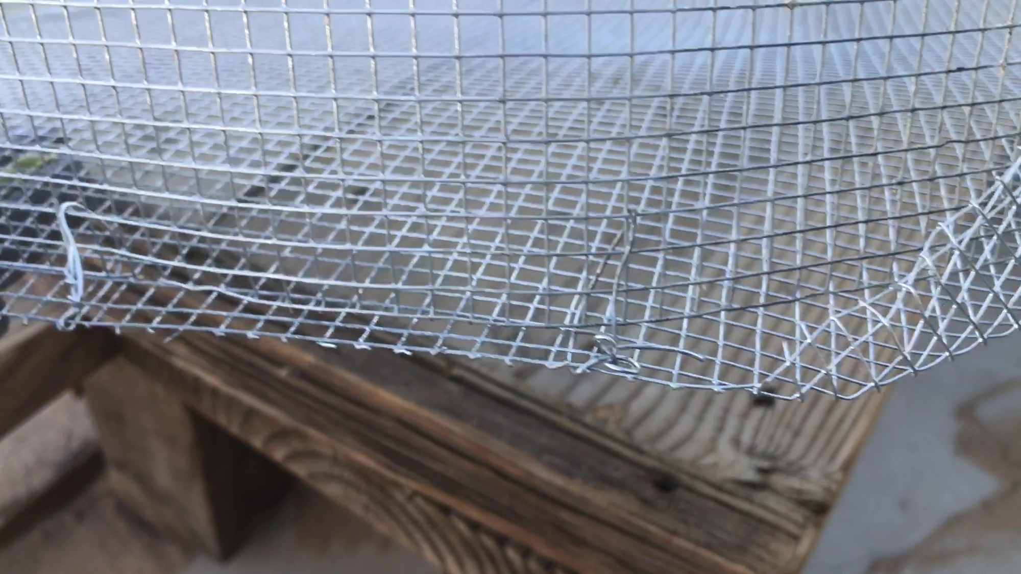 Securing Top And Base Of Wire Mesh Trash Basket With Wire