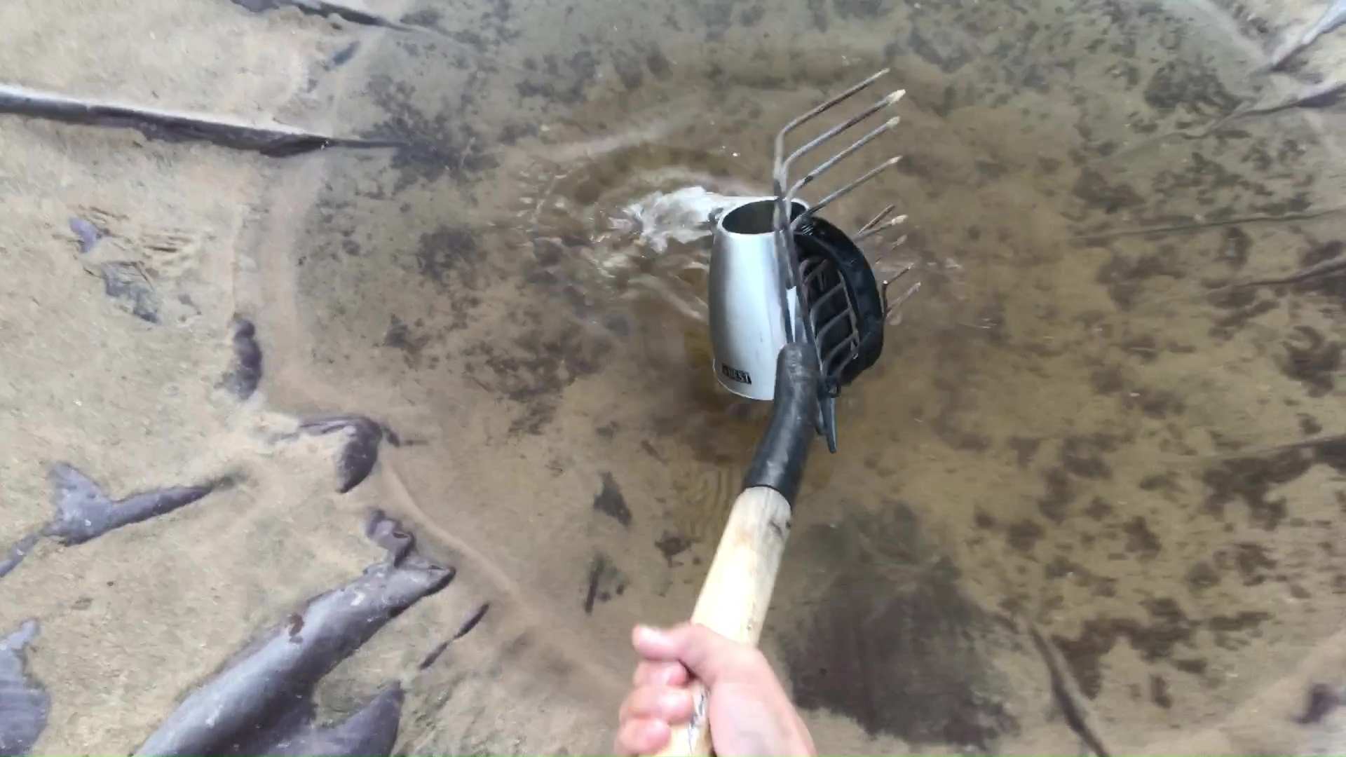 Tea Pot And Pitch Fork Rain Water Harvest Tool In Catchment Pond