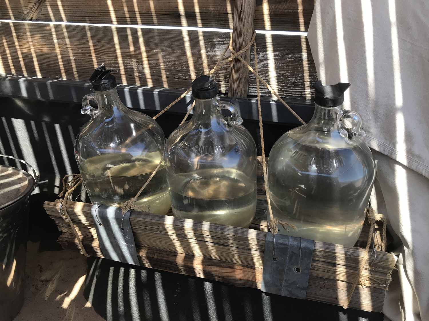 Upcycled Wood and Metal One Gallon Water Jug Rack